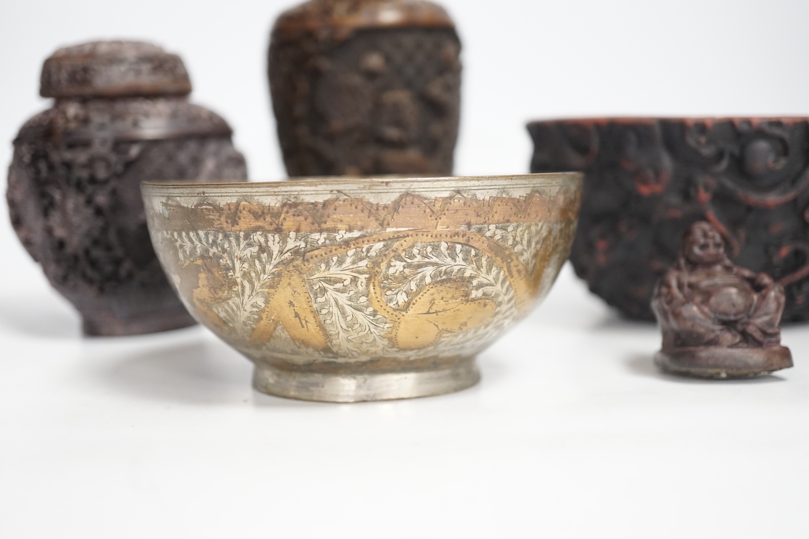 An Indian bronze bowl, two Chinese jars, 'dragon' bowl and a seated figure of Buddha, 15cm high